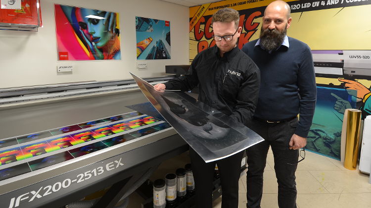 Brent Hardy-Smith (right) put the new Mimaki JFX200-2513EX through its paces with the help of Hybrid's showroom technician, Ashley Carr (left).