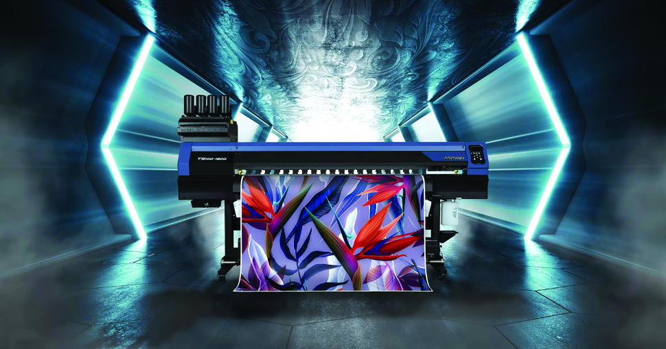 Mimaki’s distributor for the UK and Ireland, Hybrid Services has today announced the addition of two new high performance textile printers to its market-leading product portfolio – the Mimaki TS100-1600 and the Mimaki Tiger-1800B MkIII Printer.